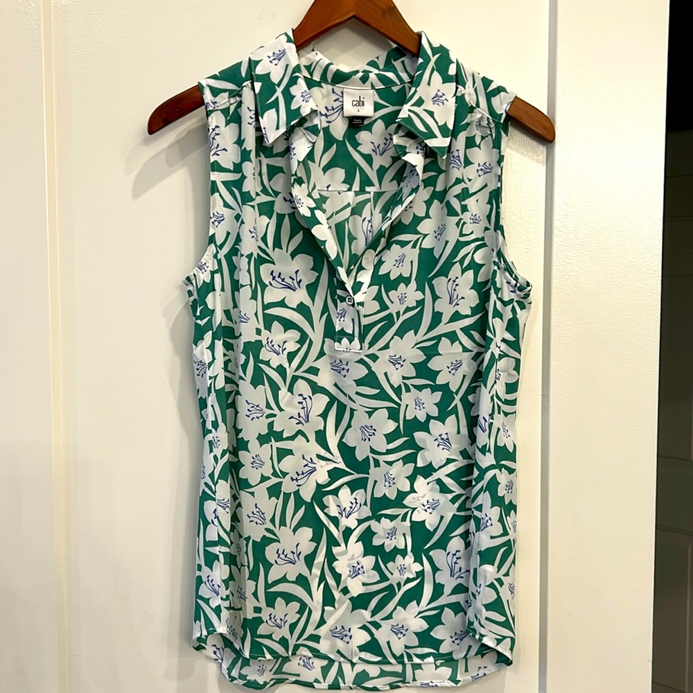 Cabi Bloom Top - single button, tunic length with shirttail.  Poly Crepe